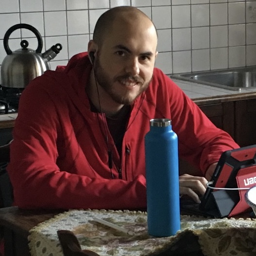 Nicholas Licalsi sitting at a kitchen table